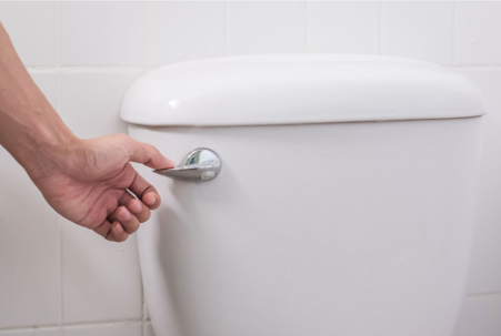 Close up of a toilet being flushed