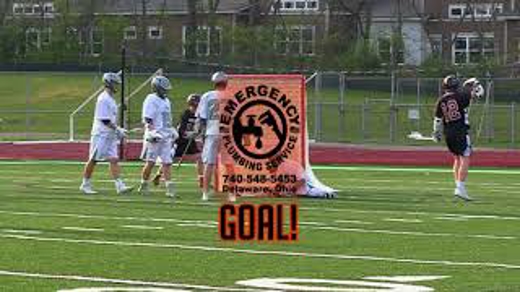 Lacrosse players stand near a goal in a snapshot for a video about emergency plumbing services.
